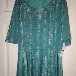 Price Reduced 6/3   Brand new Lularoe Emna top